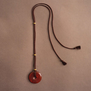 Walnut Twisted Silk Cord Carnelian Discus Necklace